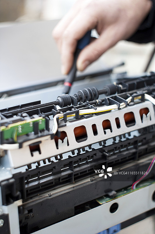 激光打印机维修工图片素材