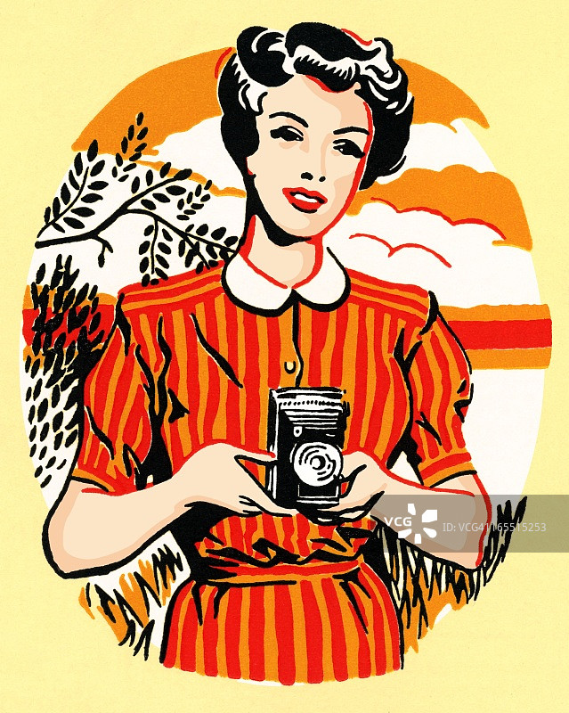 手持相机的女人图片素材