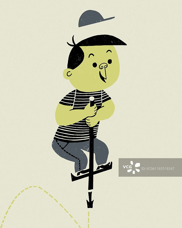 玩跳跳杆的男孩图片素材