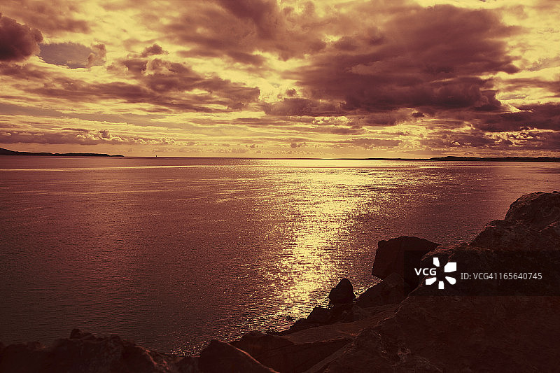 卡马森湾日落图片素材