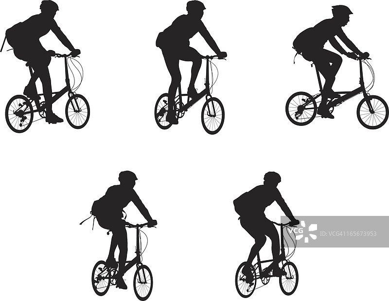 人们骑自行车图片素材