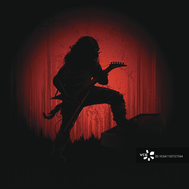 聚光灯下的金属吉他手图片素材