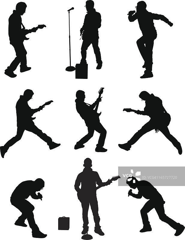 在舞台上唱歌和弹吉他的男人图片素材