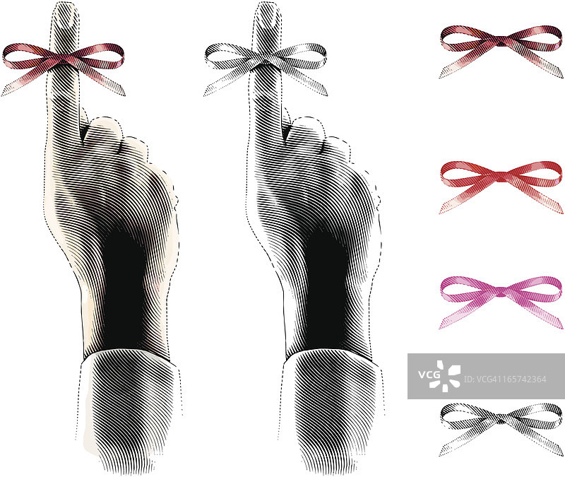 系着提示蝴蝶结的手指图片素材