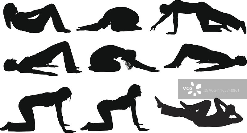 健身男人们和女人们在做瑜伽图片素材