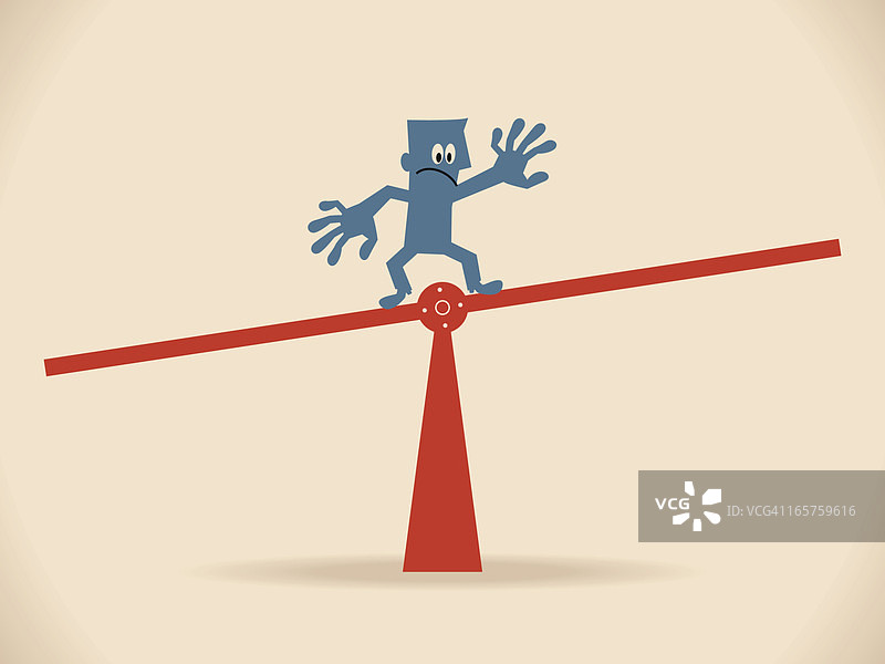 站在跷跷板上保持平衡的商人图片素材