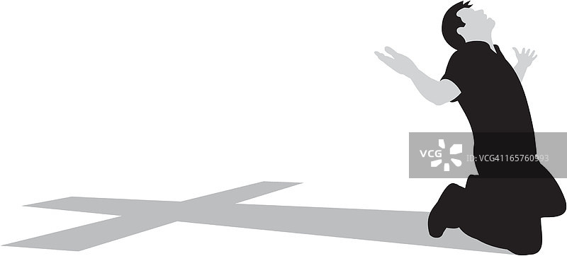 跪在十字架前图片素材