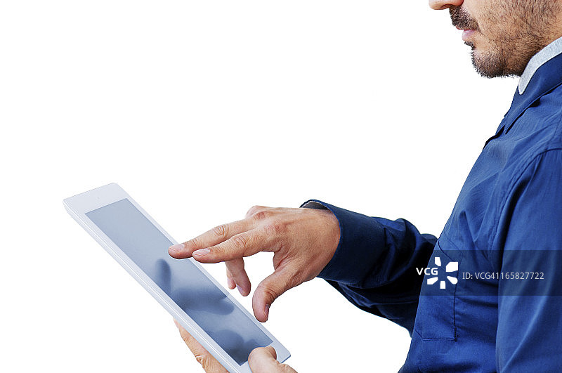 使用触摸屏平板电脑的商务男士图片素材