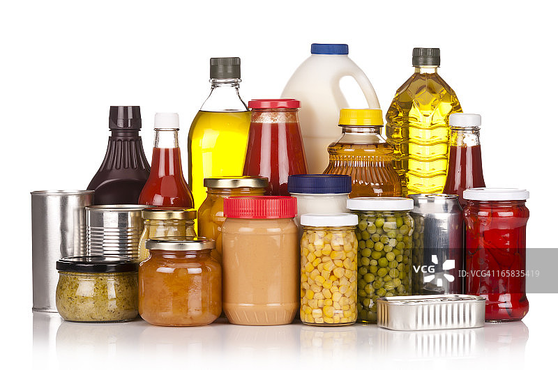 大量罐头食品摆放在白色背景上图片素材