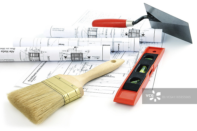 房屋建造蓝图，配有刮刀和刷子图片素材