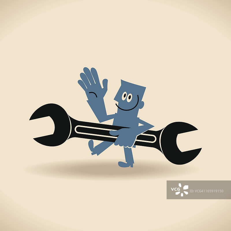 劳动节快乐！男人拿着扳手图片素材