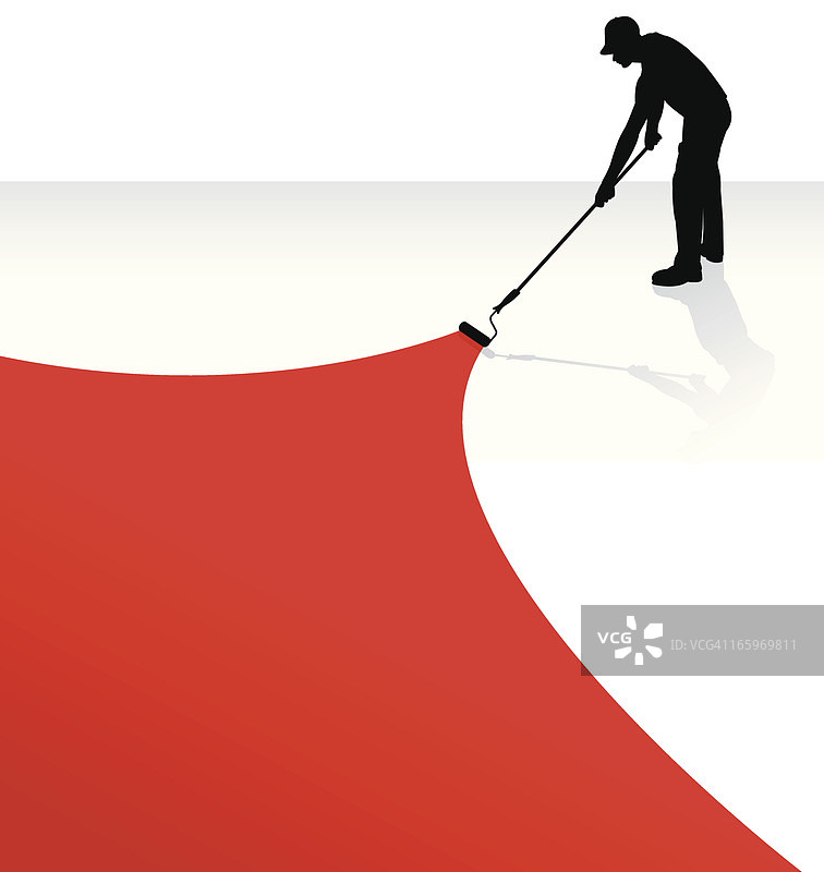 油漆工正在进行家居装修，使用油漆滚筒图片素材