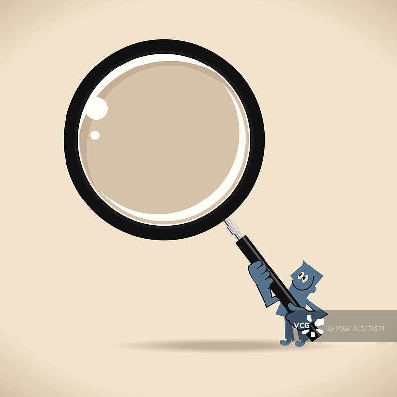男人用放大镜搜索图片素材