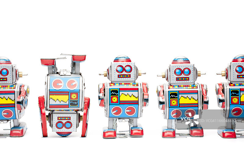 颠倒的锡制玩具机器人图片素材