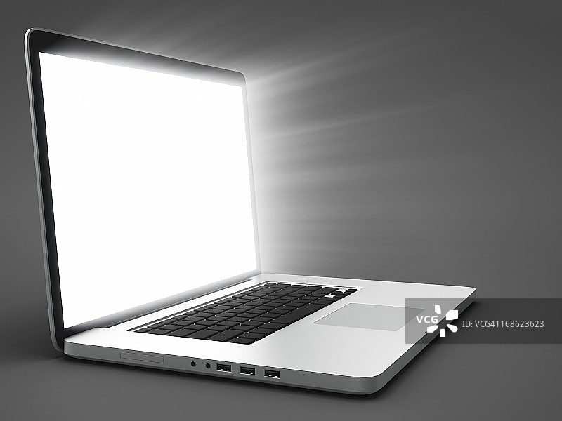 光线下的打开的笔记本电脑图片素材