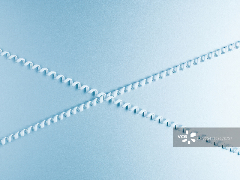 两条缠绕在一起的电话线图片素材