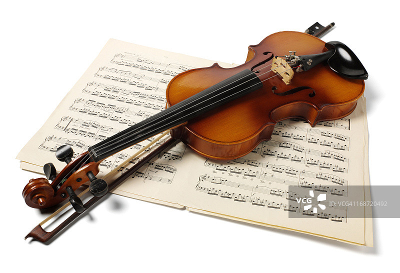 小提琴、弓和乐谱图片素材