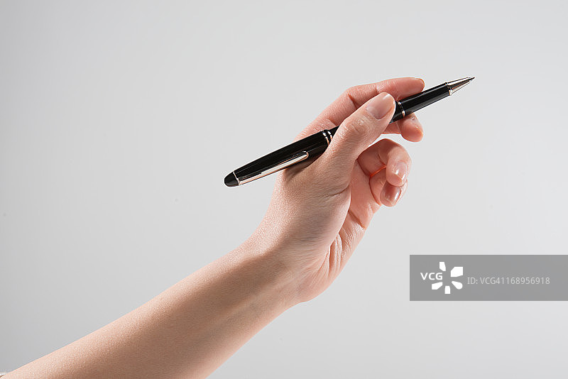 手持笔图片素材