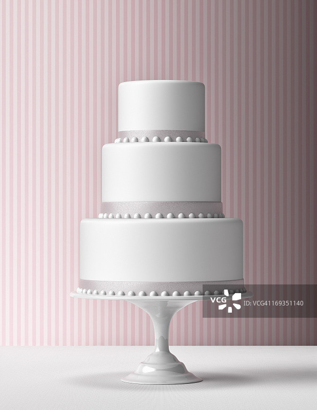 粉色背景下的阶梯式翻糖蛋糕图片素材