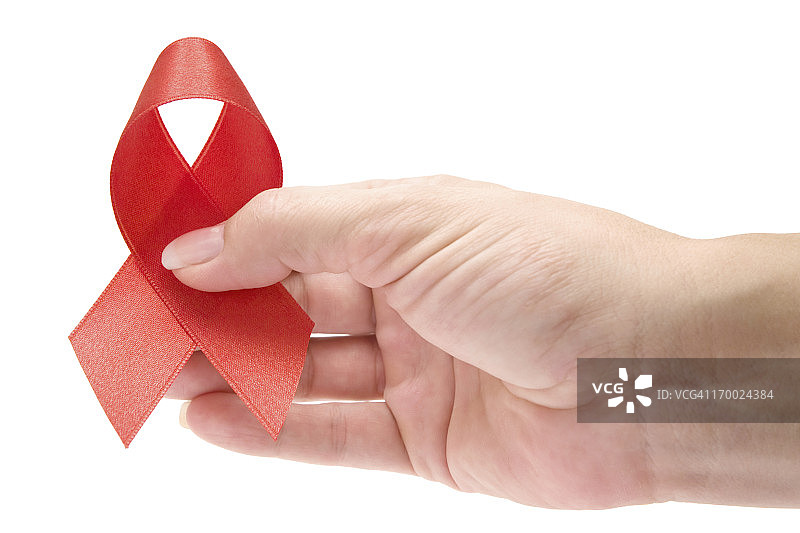 手持艾滋病防治宣传丝带图片素材