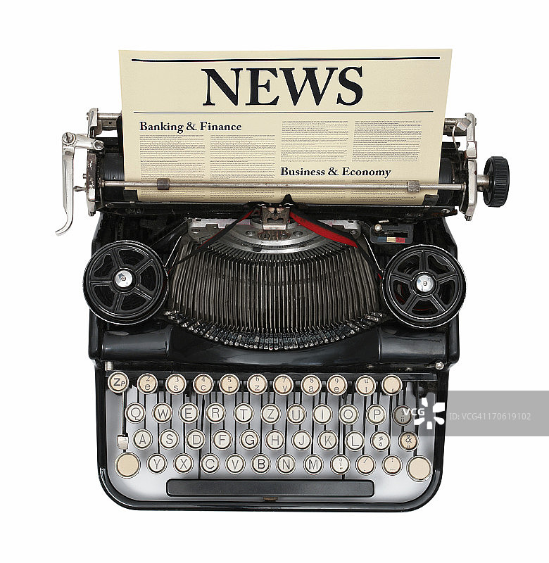 老式打字机与新闻稿件图片素材