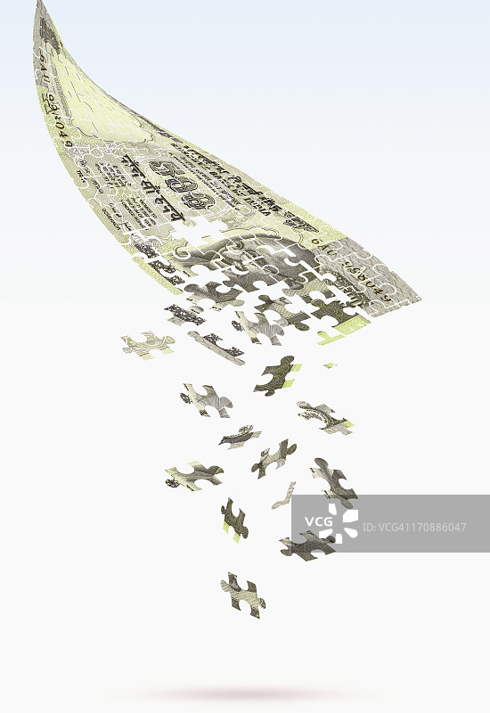 印度五百卢比纸币拼图碎片掉落图片素材