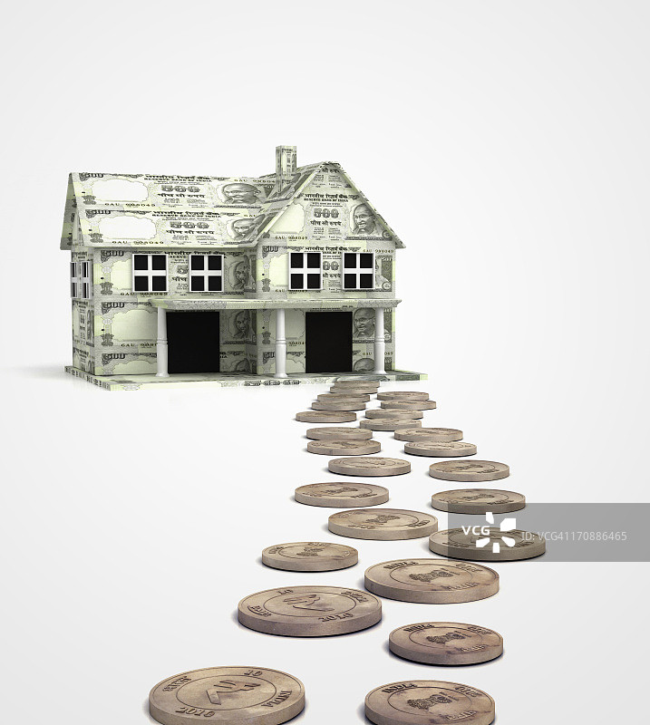 硬币引向纸币房屋的路径，隔离在白色背景上，代表房屋贷款图片素材