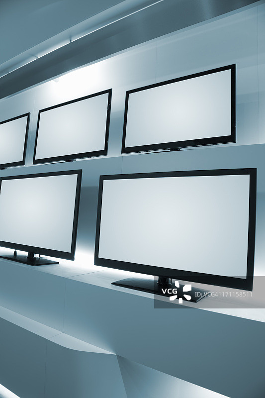 电视商店中成排的液晶电视图片素材