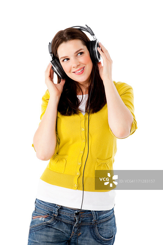 听音乐的优雅年轻女子图片素材