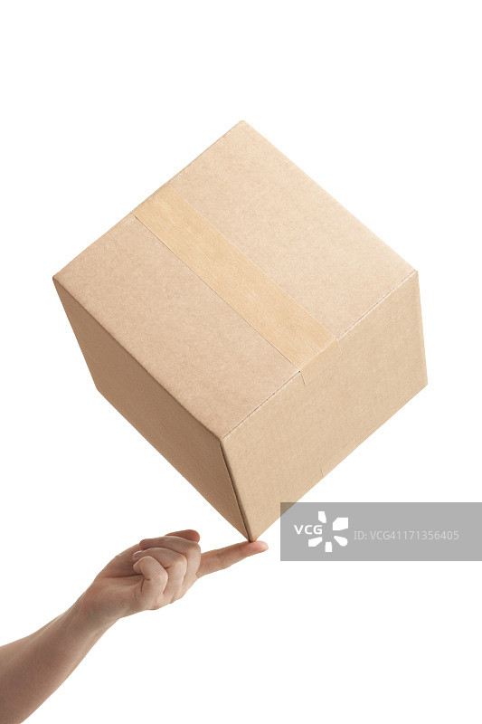 指尖平衡纸板箱图片素材