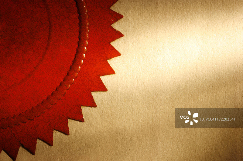 泛黄纸上的红色印章特写图片素材