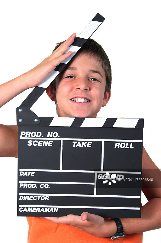男孩和电影场记板图片素材