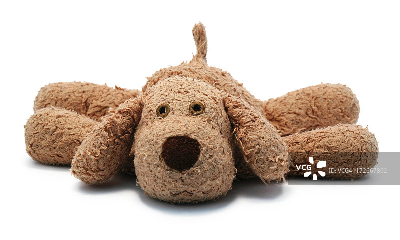 心爱孩子的狗狗毛绒玩具图片素材