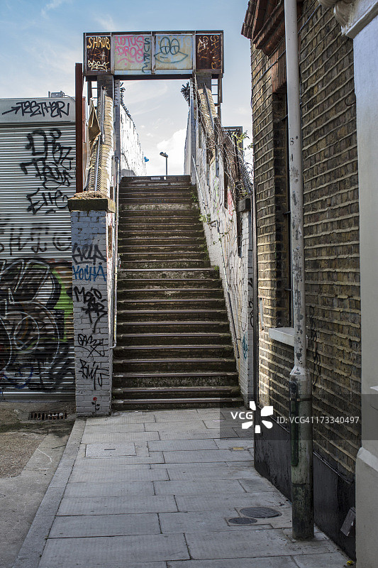 肖尔迪奇砖巷附近的涂鸦旧楼梯图片素材