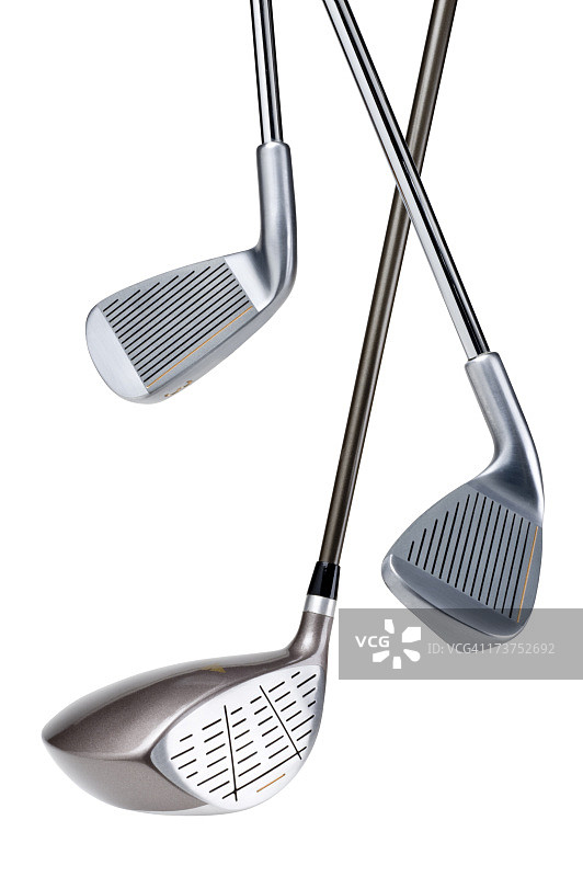 白色背景上的三种不同类型的高尔夫球杆图片素材
