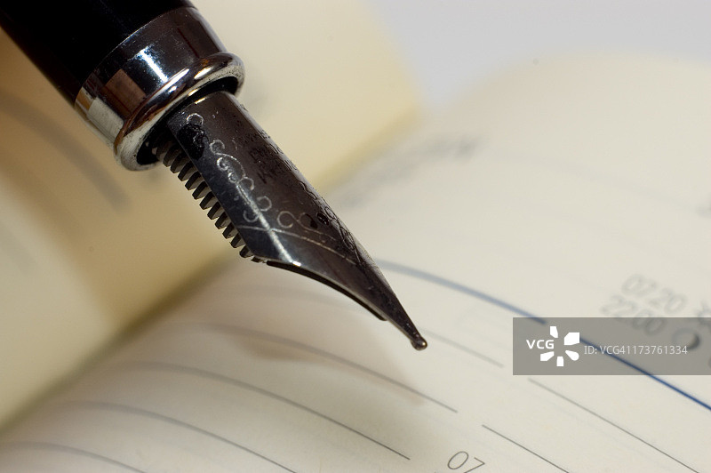 钢笔和笔记本图片素材