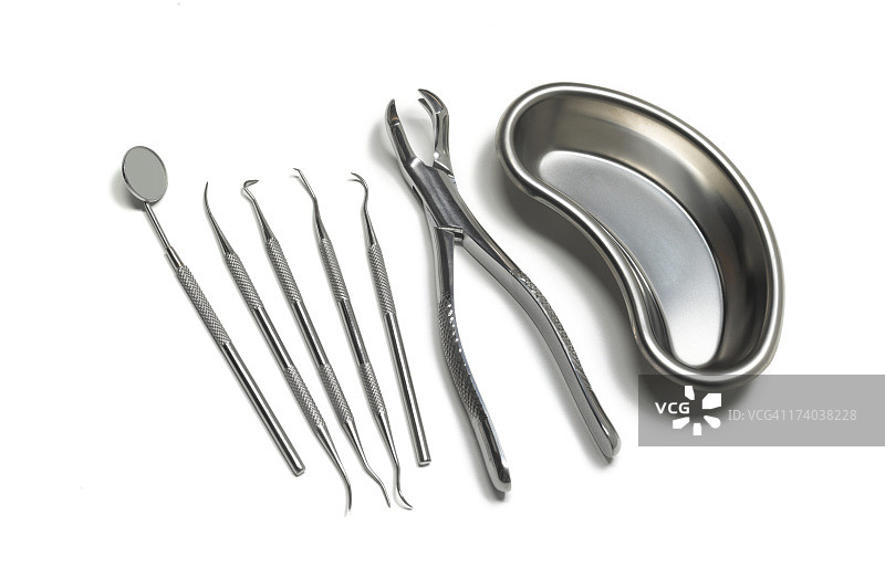 带拔牙器的牙科工具图片素材