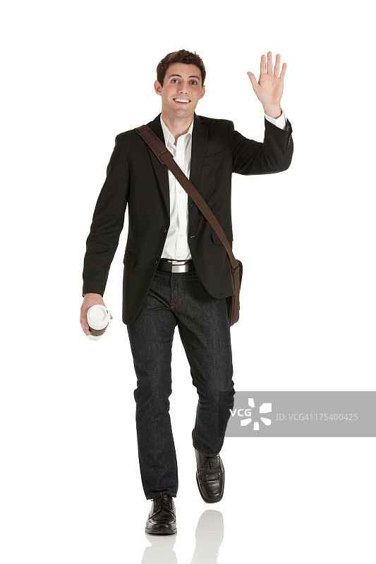 快乐的商人挥手图片素材