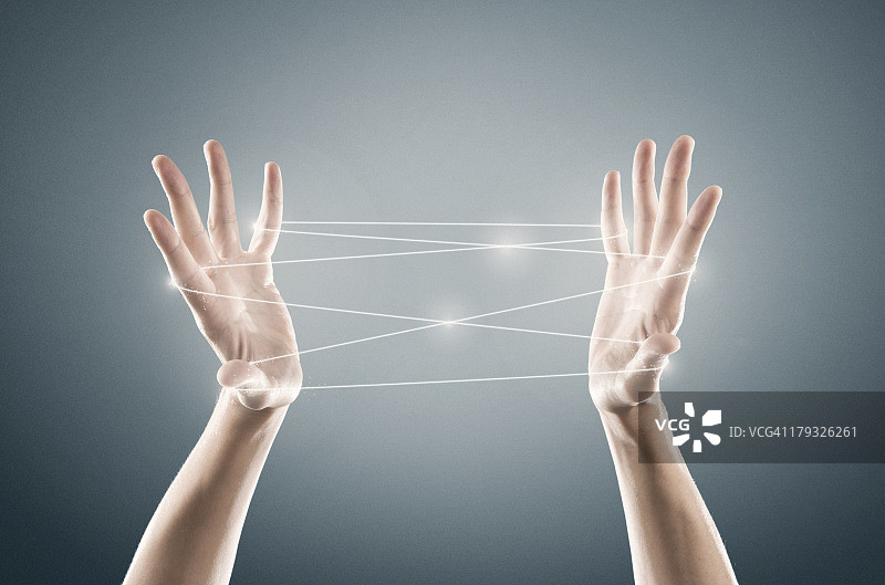 手和猫的摇篮图片素材