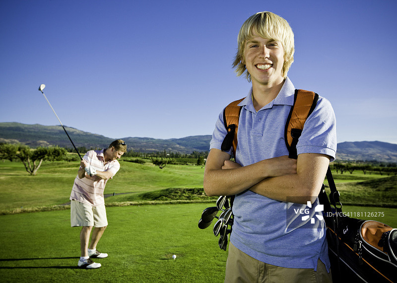 父子打高尔夫图片素材