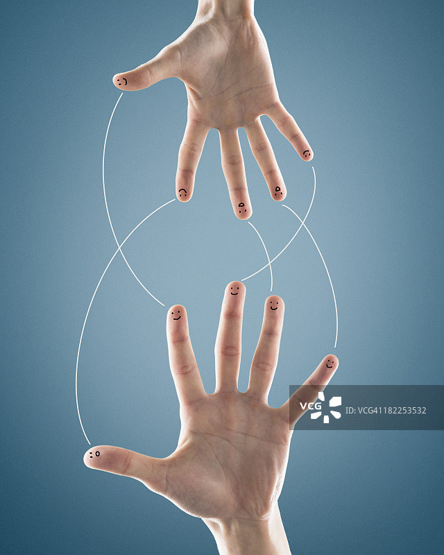 指尖上画着脸图片素材