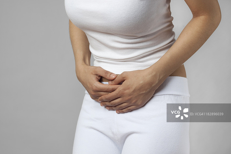 腹痛或痉挛的女人图片素材