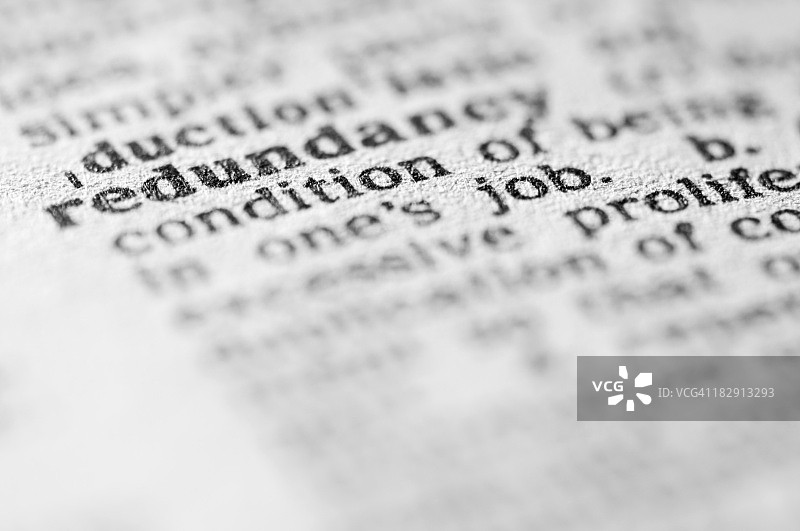 黑色字体显示的“冗余”词典释义图片素材