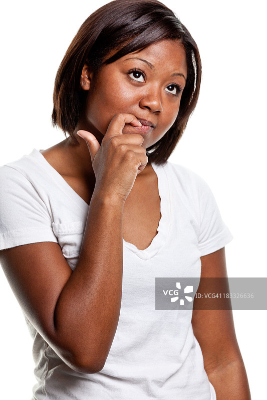 年轻女子咬指甲图片素材