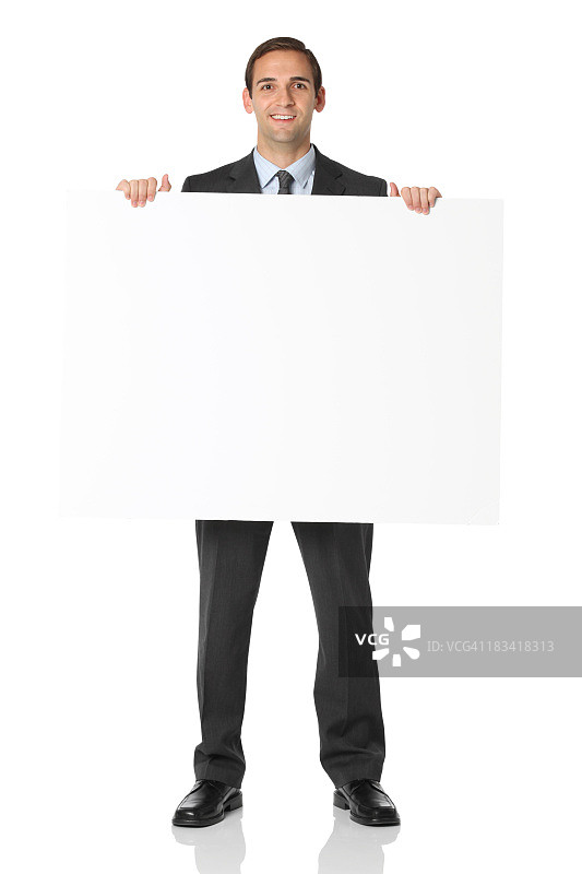 手持空白标牌的商务人士全身像图片素材