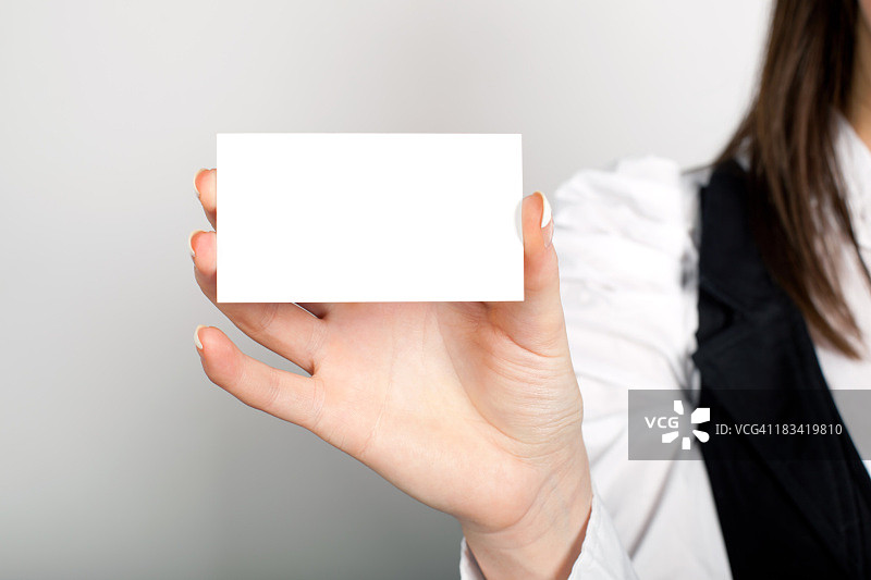 手中的空白名片图片素材