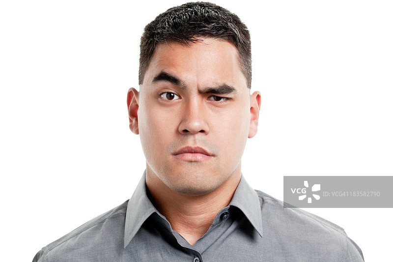 挑眉表示不确定的年轻男人图片素材