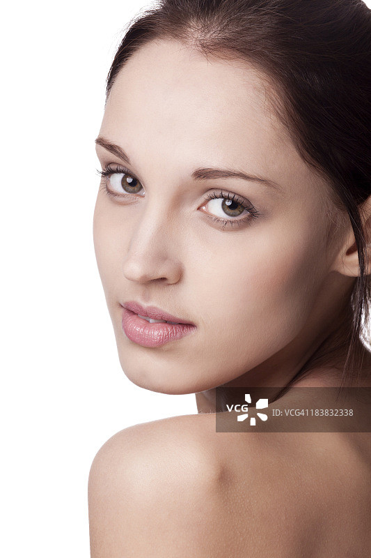 白色背景上的年轻女子面部图片素材