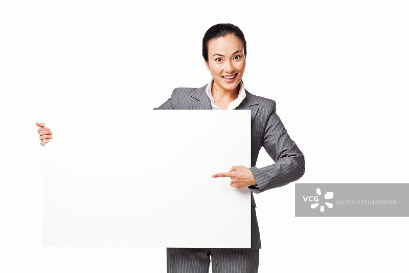 拿着大块空白标牌的女商人 - 隔离图片素材