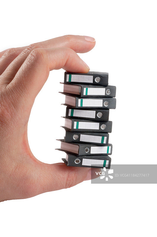 成堆的办公文件夹：环形装订器图片素材